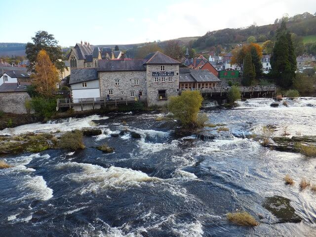 View of The Corn Mill and rapids on the River Dee