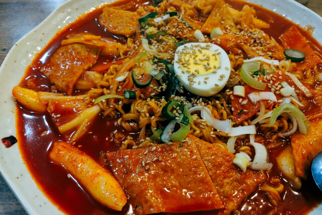 korean noodle dish with a boiled egg
