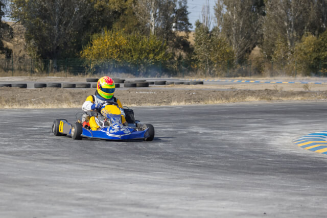 person go karting on a track
