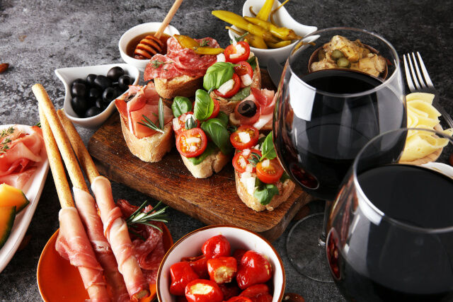 selection of tapas antipasti and wine
