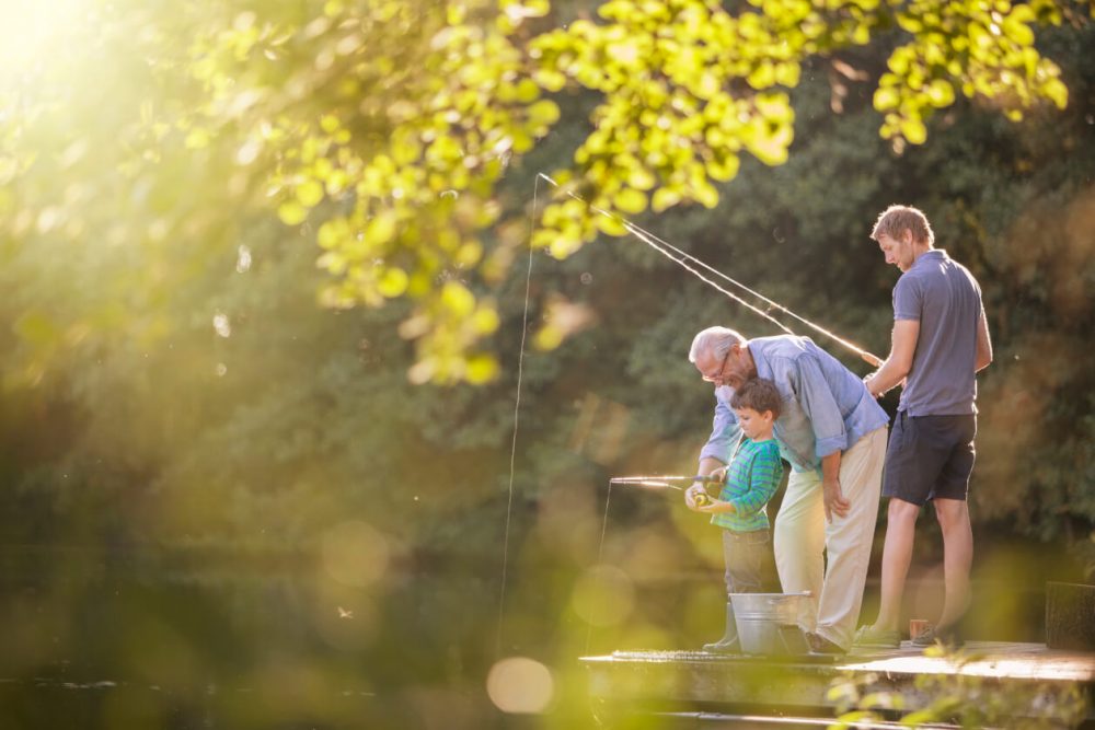 senior man, adult man, child fishing