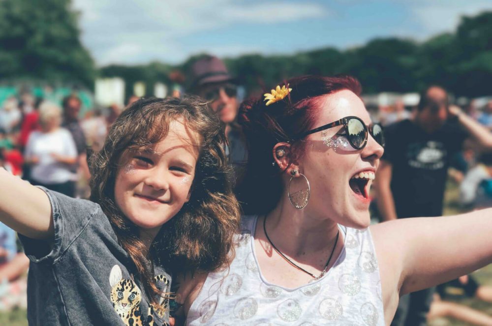 two people enjoying a festival