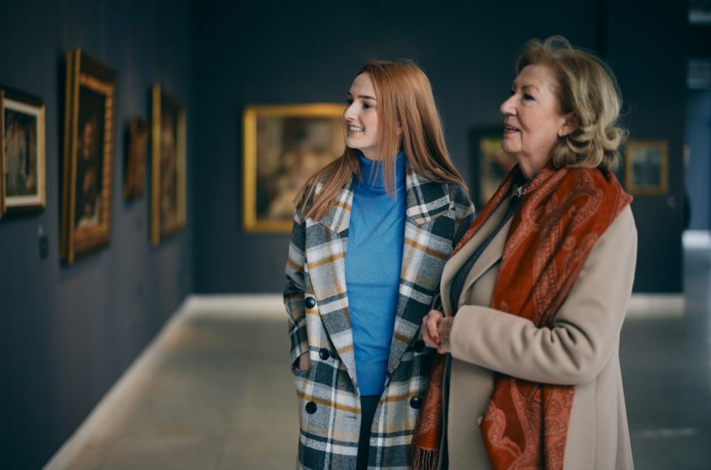 two women looking around museum